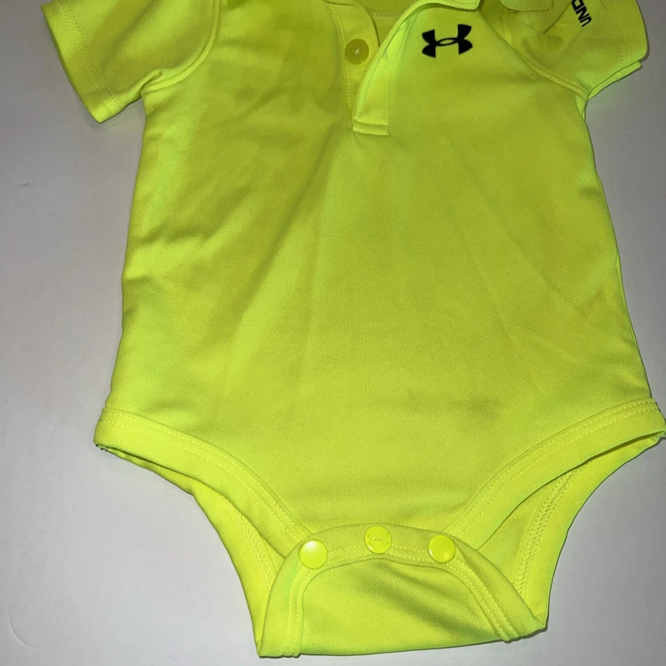 Polo Under Armour HeatGear Infantil Una Pieza a Presión Amarillo Brillante 0/3M Recién Nacido Foto 2 de 4
