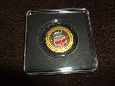 Tschad, 3000 Francs, 1/500 oz Gold, ''Marienkäfer mit drei Bändern'', farbig. (2)