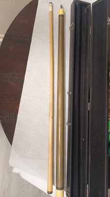 Two-piece Players brand pool cue with a hard storage case.