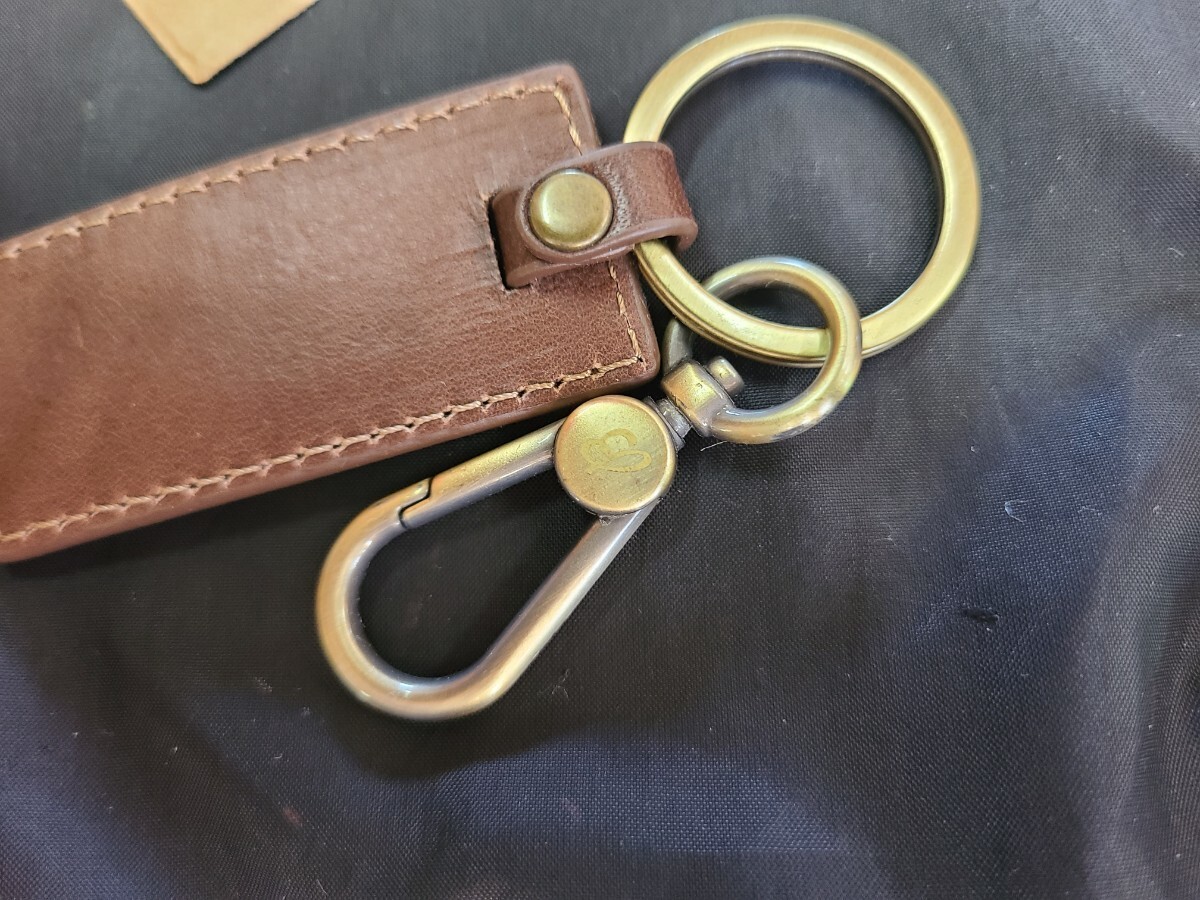 Genuine BREITLING leather keychain keyring with storage bag