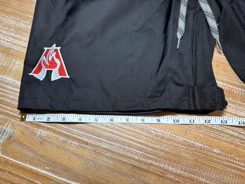 Pantaloncini Bauer Ice Hockey Shell Cover Atlanta Fire Uomo M Nero Nuovi con etichette - Foto 18 di 18
