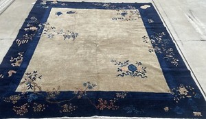AN AUTHENTIC PEKING CHINESE RUG