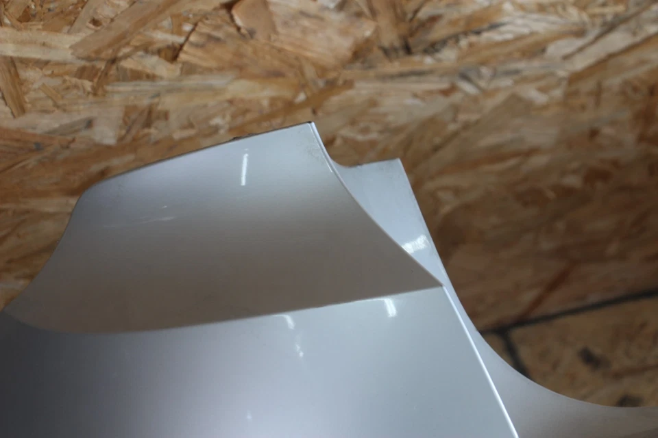 Cubierta del panel de moldura del parachoques trasero 2012-17 plateada BMW OEM F07 550i GT + LCI Foto 3 de 4