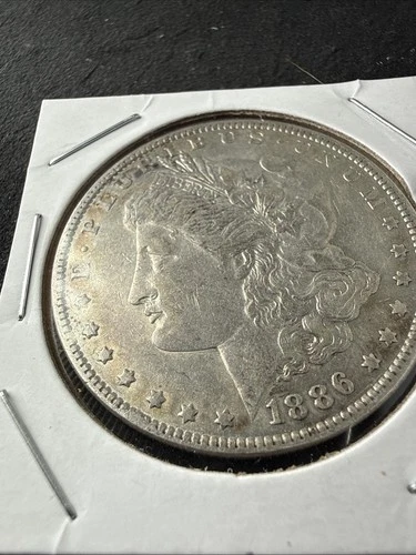 1886-O Morgan $1 – AU Circulated – Better New Orleans Semi-Key Date