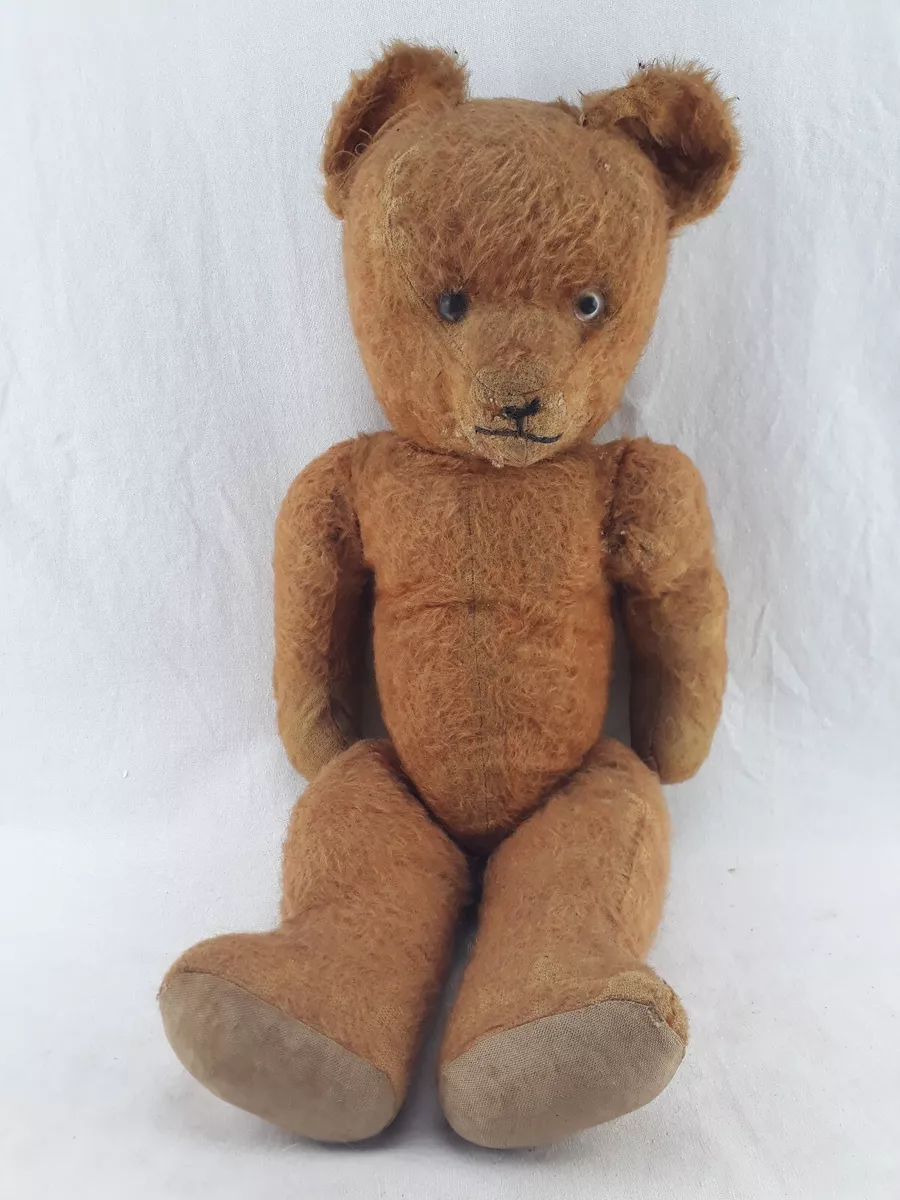 Vieil ours en peluche hotsell