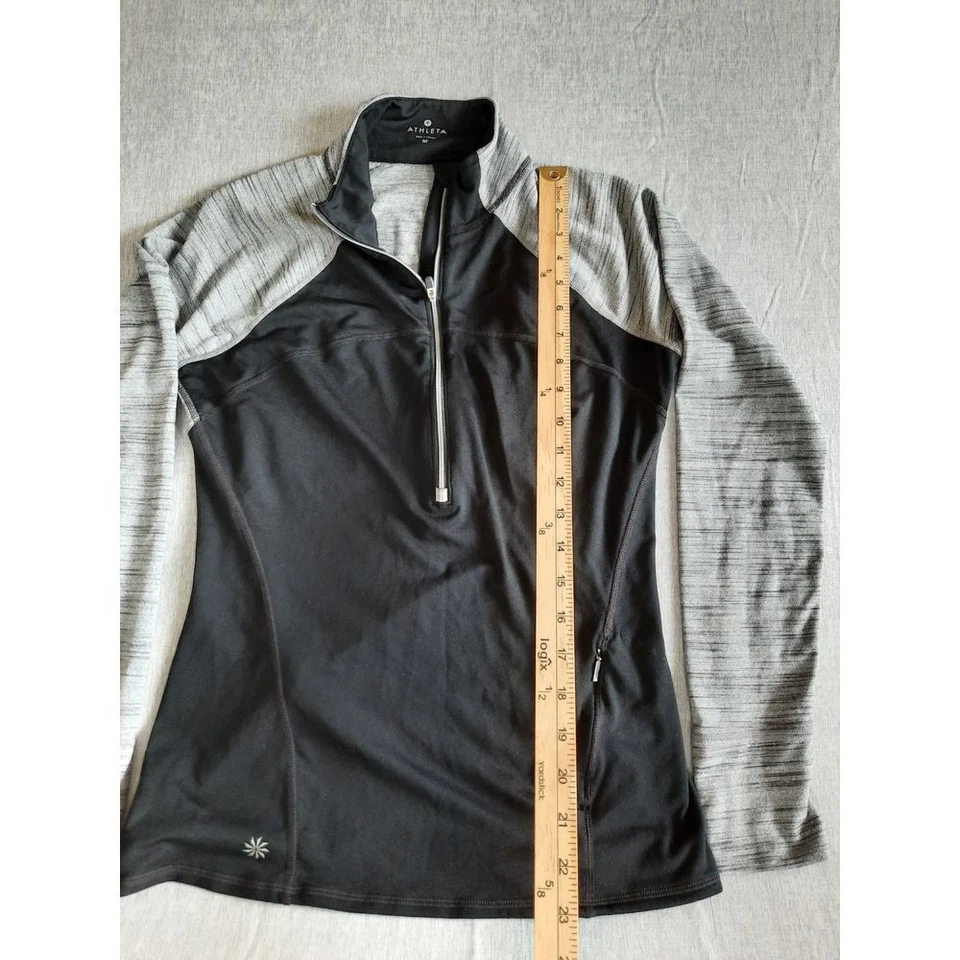 Camiseta deportiva para mujer Athleta de rendimiento medio elástica con cremallera manga larga raglán Foto 2 de 4