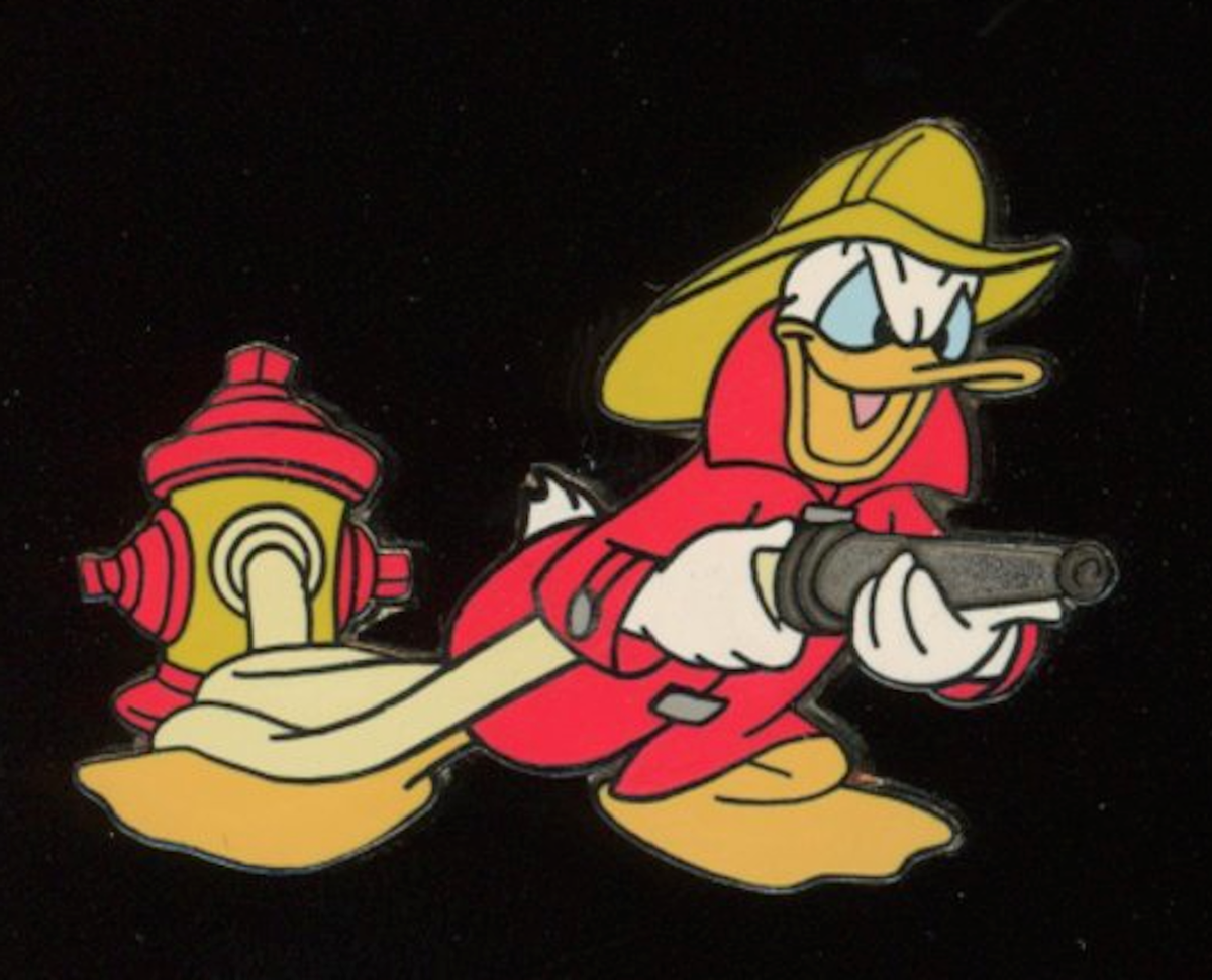 Rare 2000 Disneyland Fireman Firefighter Donald Duck with Hose