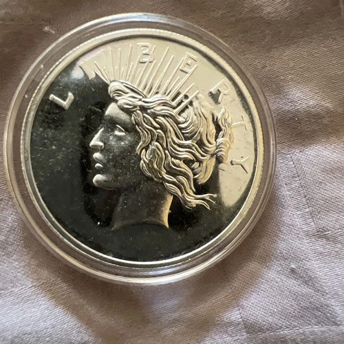 Silver bullion Mercury Dime One Ounce silver round .999 fine silver