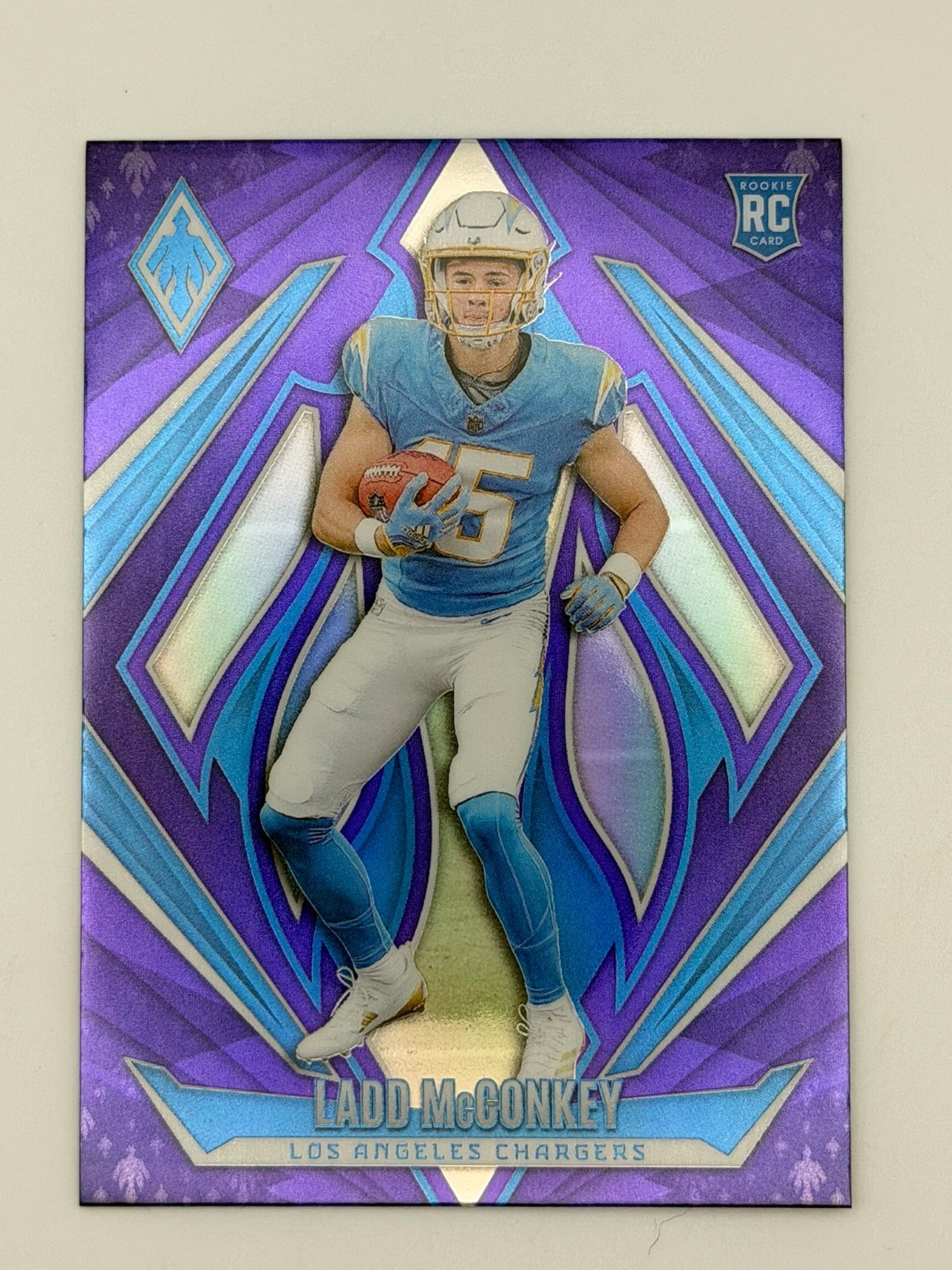 2024 Panini Phoenix - Rookies Ladd McConkey #216 Purple Fade (RC)