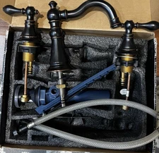 Signature 8 in. Widespread 2-Handle Bathroom Oil Faucet with Drain Assembly