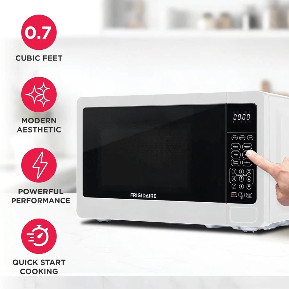 Microondas de encimera Frigidaire 0,7 pies cúbicos 700 W 10 niveles de potencia (blanco) Foto 3 de 4