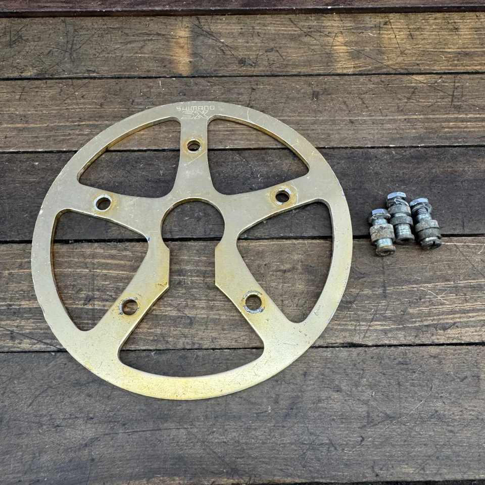 Plato de colección Shimano SX Bash Guard BMX aleación dorada anodizado doblado 3 pernos Foto 3 de 4