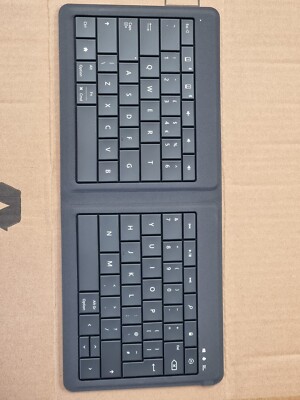 Microsoft Bluetooth faltbare Tastatur verpackt - defekt - nur für Teile