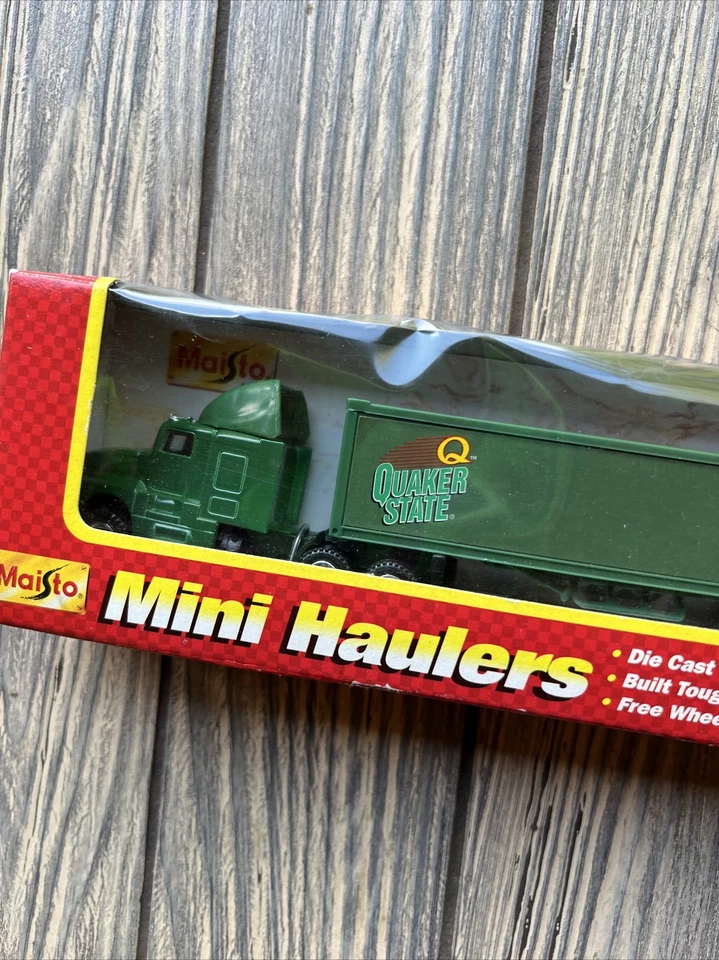 Mini transportadores Maisto de metal fundido a presión de plástico cuáquero estado pulido 50 verde Foto 2 de 3