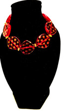 8 1/2 Bracelet red Oval with red dots inside the Bead  with Gold Leaf  Clasp