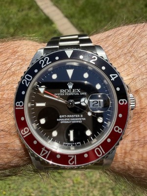 Rolex GMT-Master II Red/Black 24-Hour Bezel Black Dial 40mm Auto Box