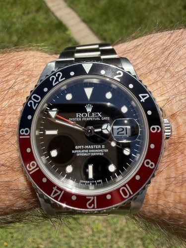 Rolex GMT-Master II Red/Black 24-Hour Bezel Black Dial 40mm Auto Box