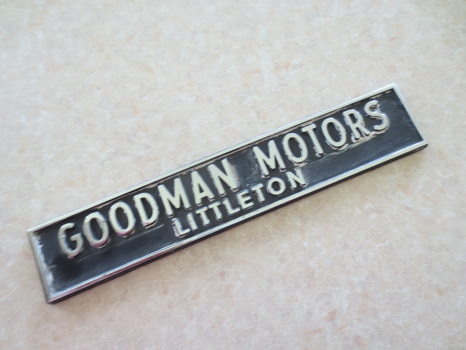 Goodman Motors Littleton Denver dealership car metal badge / emblem