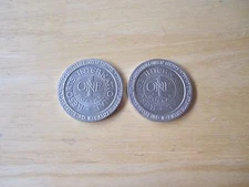 Lot of (2) 1987 Atlantic City, NJ Resorts International Casino One Dollar Token