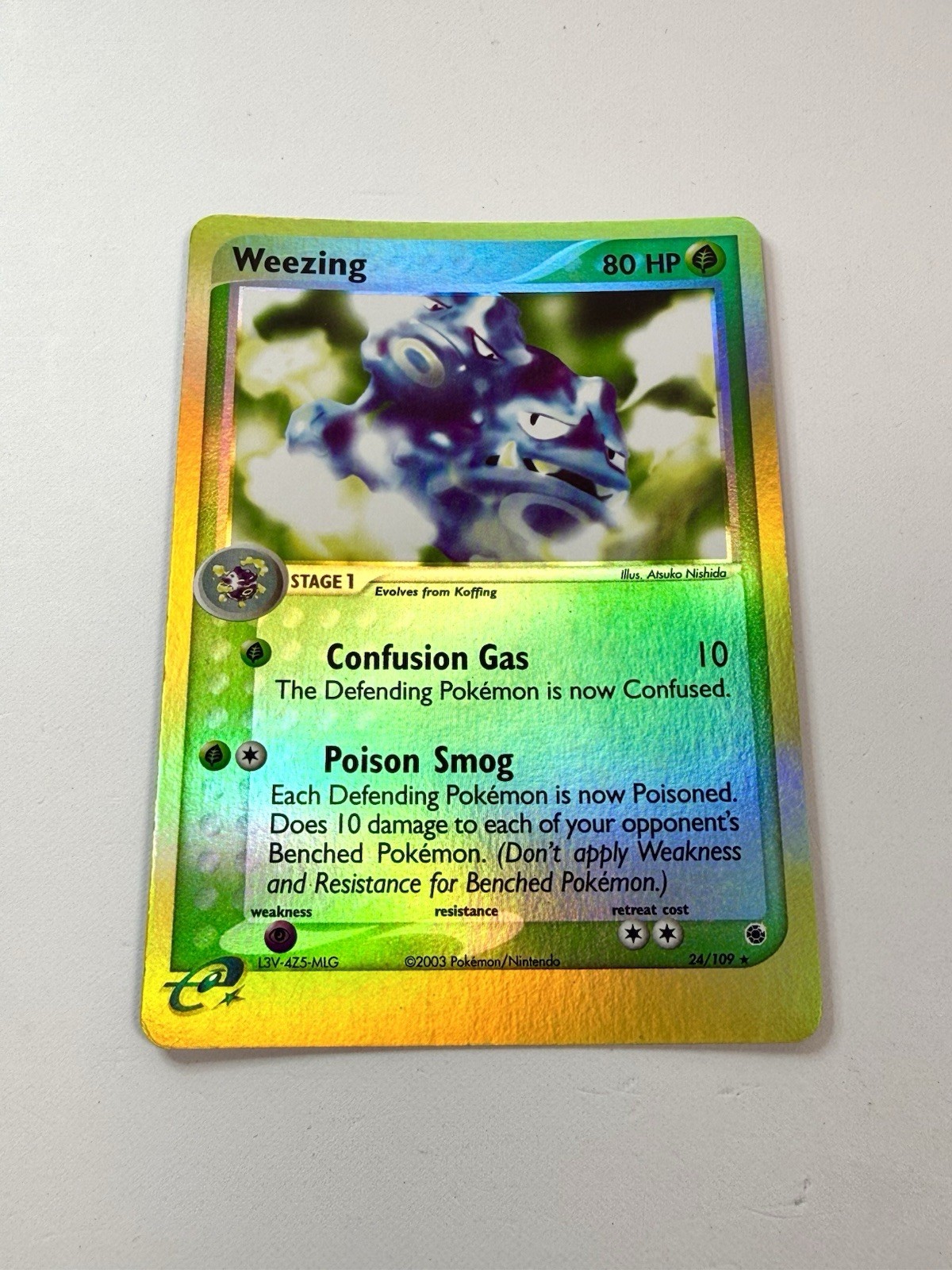 Weezing 24/109 Reverse Holo Rare EX Ruby & Sapphire NM 2003 E-Reader