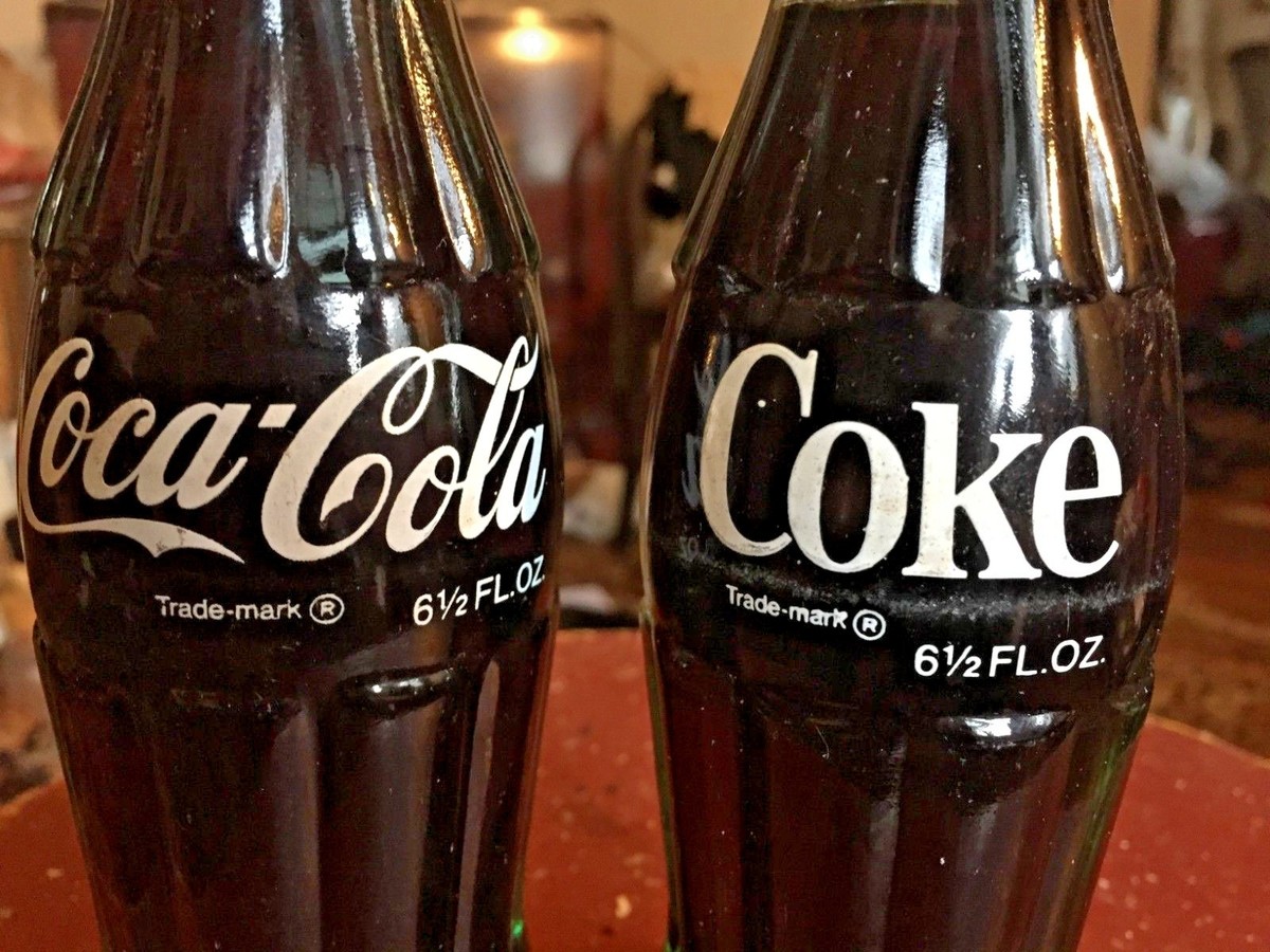 8 pack - 6.5 ounce Coke bottle from the 1960's Unopened w 8 pack - 6.5 ounce Coke bottle from the 1960's Unopened w