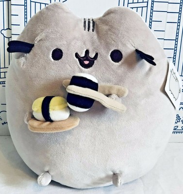 pusheen cat eating sushi