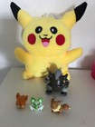 pokemon pikachu plush + Aggron +Eevee + 2 Pokemon Face Rings
