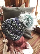 hand knitted merino wool beanie with Faux Fur Pom Pom