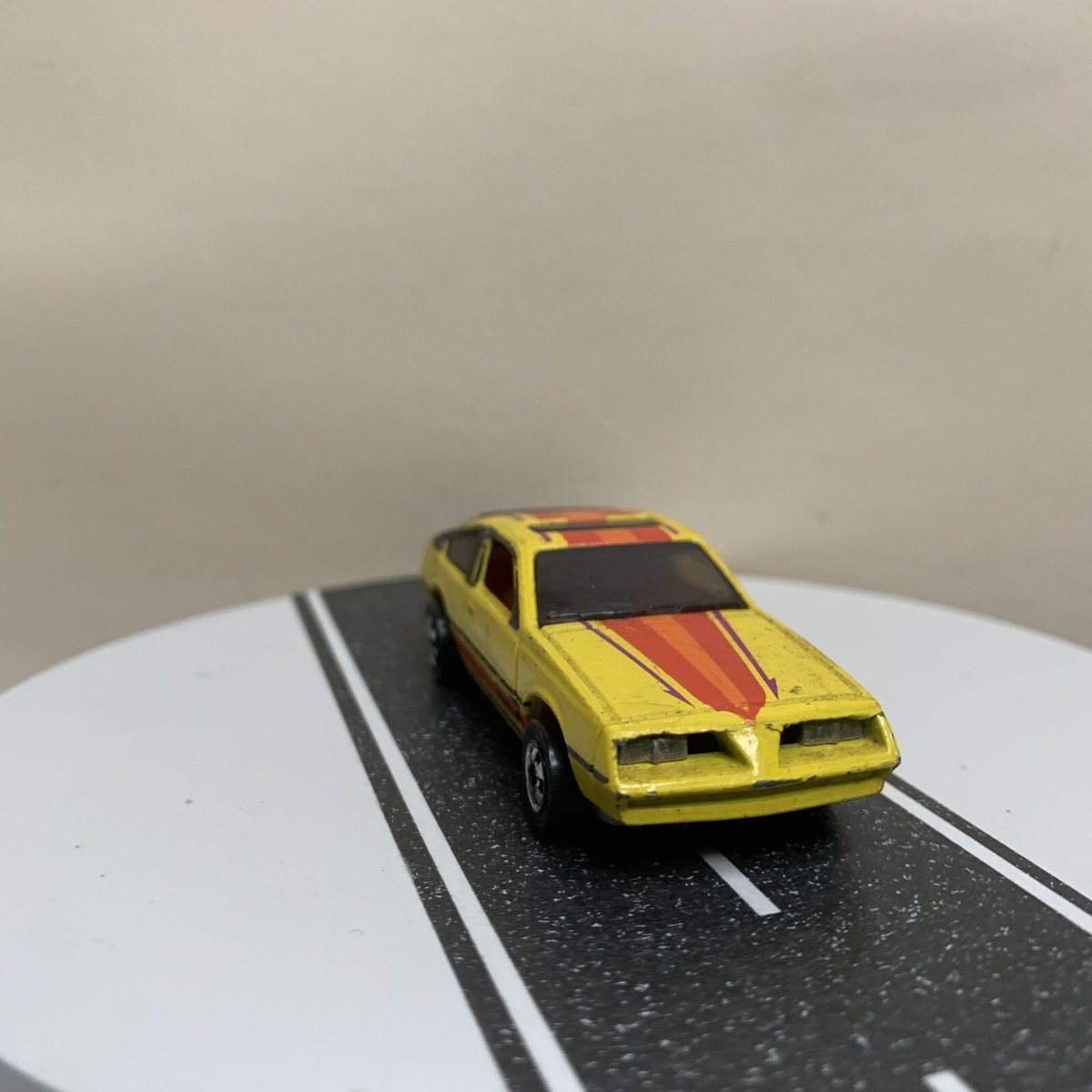 Hot Wheels 1982 Pontiac J2000 2-Door Yellow w/Red/Orange Stripes