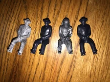 (4) vintage REL  plastic figures wagon riders 2 swirled