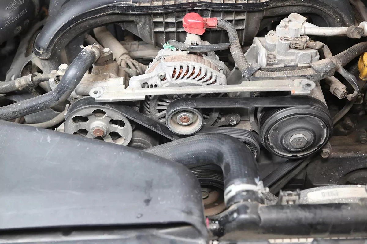 A vehicle's serpentine drive belt installed on the accessory drive.
