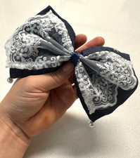 Handcrafted custom, denim lace bow hair clip/ hair rubber band.
