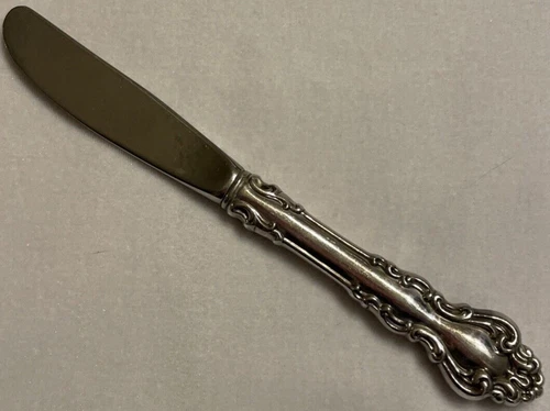 Modern Hollow Butter Spreader (Stainless) Spanish Baroque (Sterling, 1965) by R