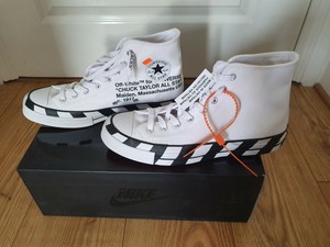 chuck norris off white converse