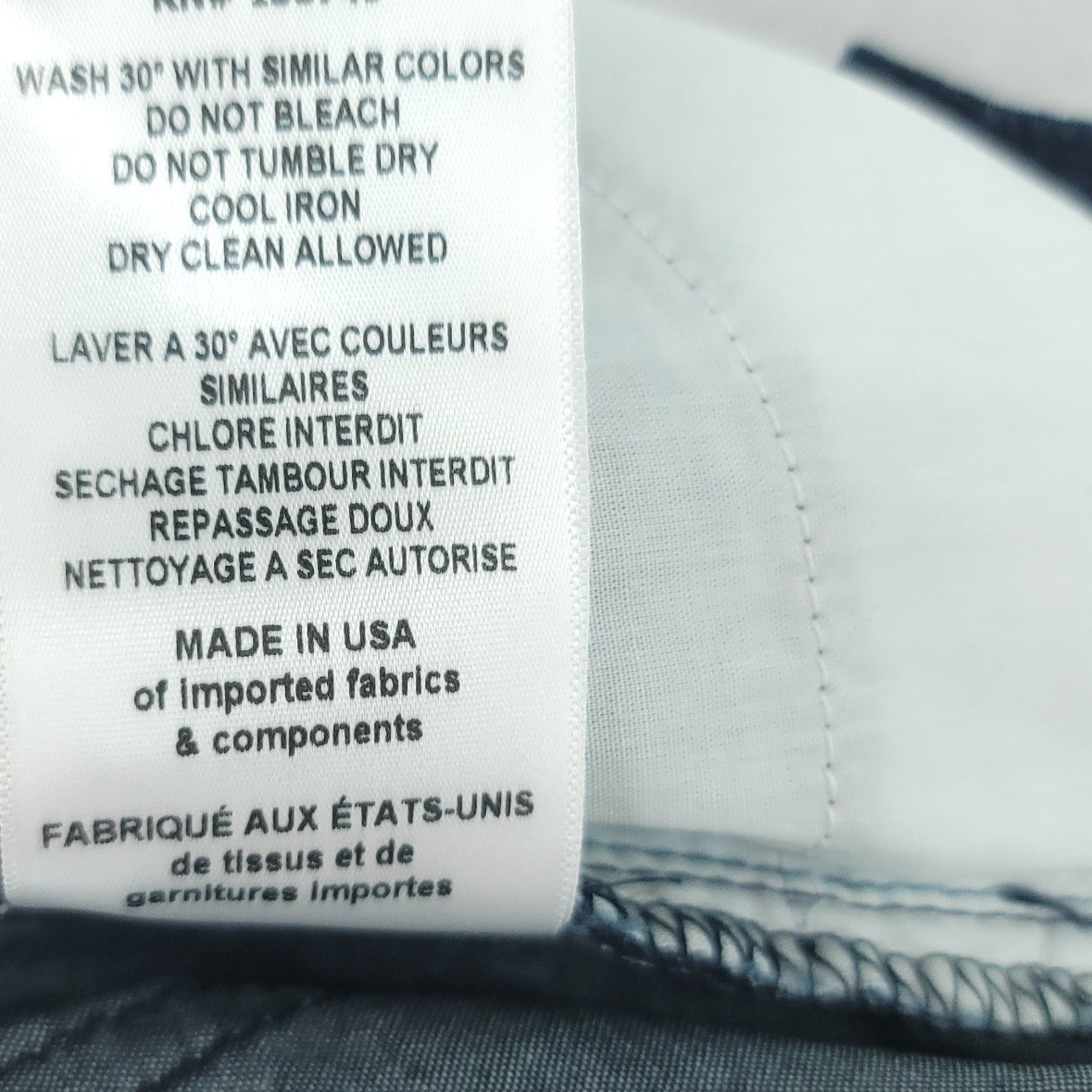 White Etienne Marcel Skinny Crop Jeans, blue NWT, with black tag inside waistband, iron, and bleach avoidance text.