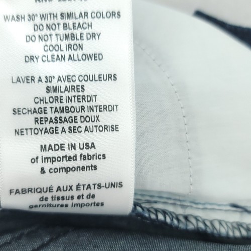 White Etienne Marcel Skinny Crop Jeans, blue NWT, with black tag inside waistband, iron, and bleach avoidance text.