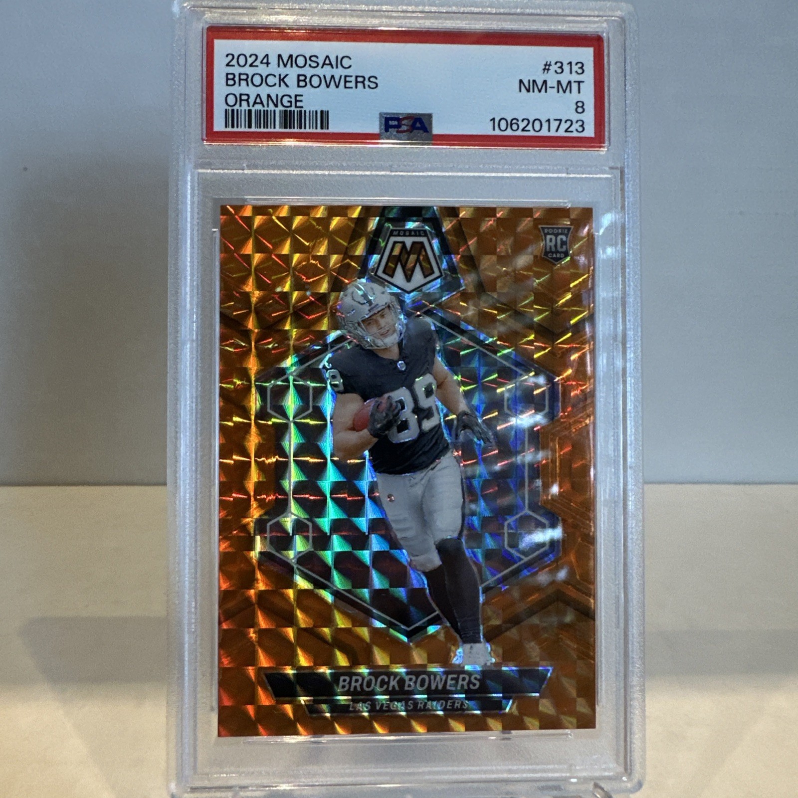 2024 Panini Mosaic - Rookie Brock Bowers #313 Orange Mosaic Prizm 138/199