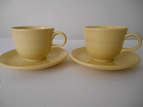 FIESTA WARE YELLOW CUP S AND SAUCERS BY HOMER LAUGHLIN