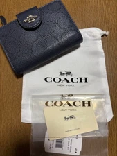 COACH Navy Embossed Leather Bifold Wallet