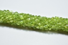 AAA  Natural Peridot Coin Shape Faceted Gemstone Beads 13 Inch 1 Strand 4-4.5mm