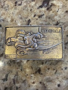 Pirelli Salvador Dali Designed Belt Buckle Fake