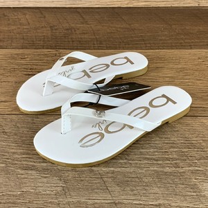 girls white flip flops