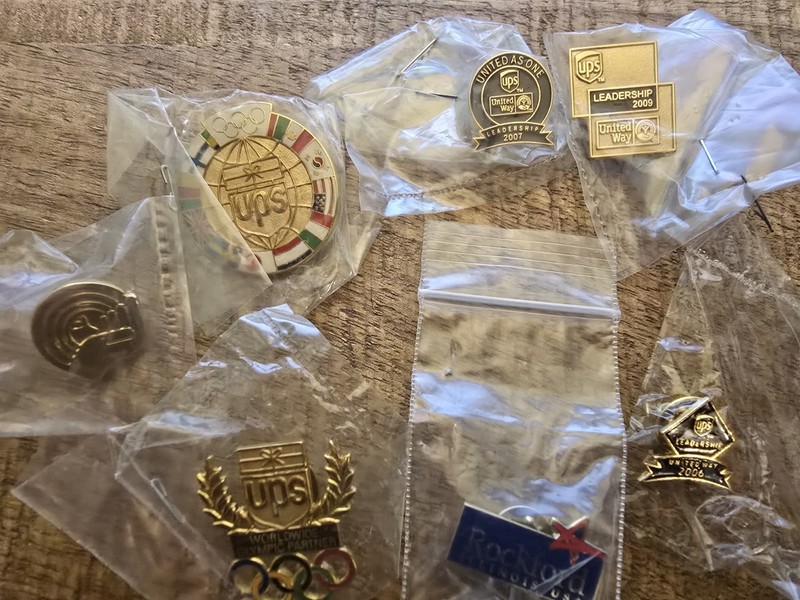 Lot Of 7 Assorted UPS United Way, Rockford Air Hub Pins