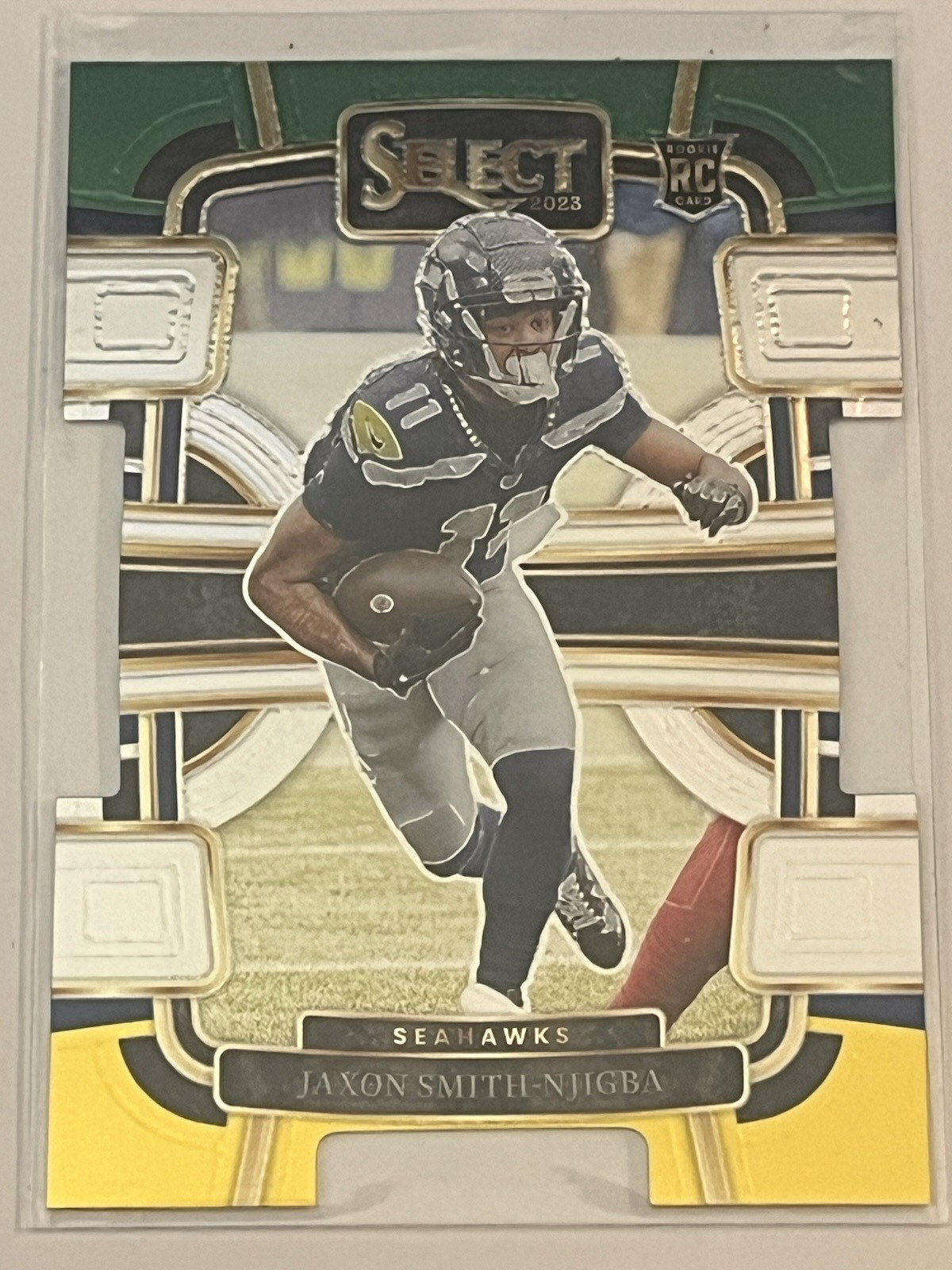 2023 Panini Select #87 Jaxon Smith-Njigba Green and Yellow Prizms Die Cuts