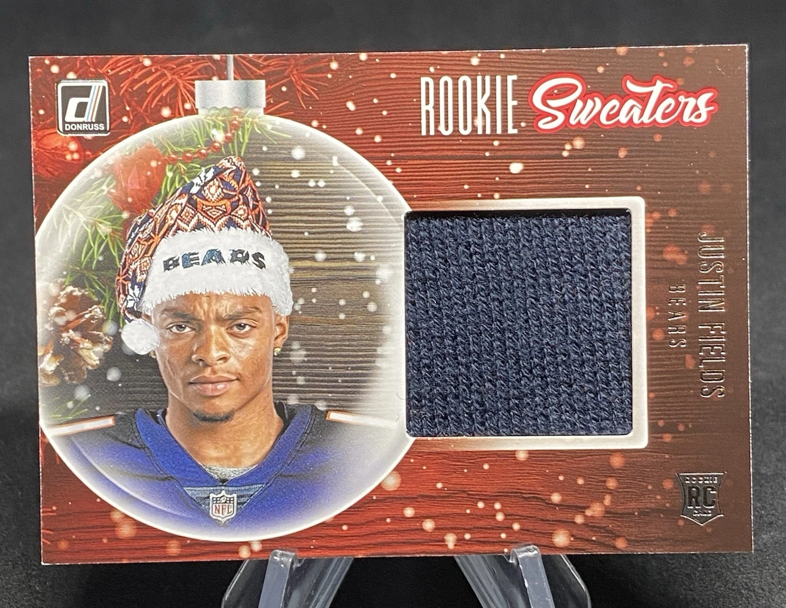 Justin Fields Panini Donruss Rookie Holiday Sweater Memorabilia #RSJFI Base