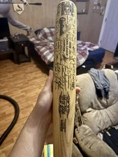Limited edition World Series baseball bat. Signed By Entire Team.