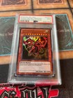 God Cards Slifer the Sky Dragon LC01-EN002 2010 Yugioh PSA 9 MINT (stock photo)