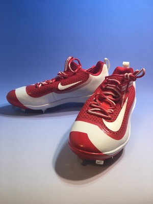 red and blue baseball cleats
