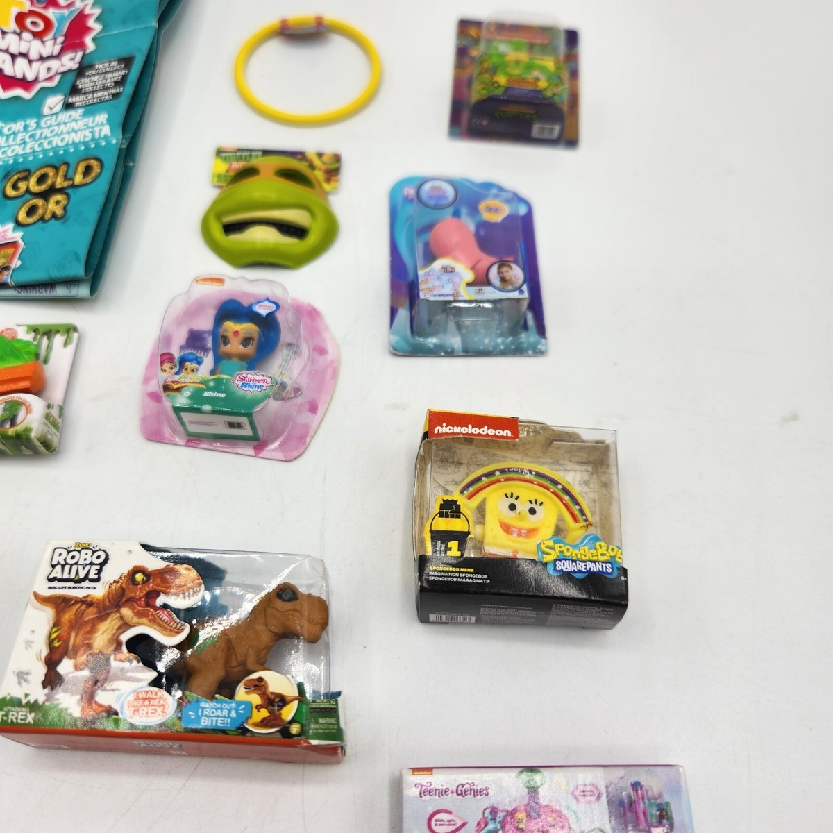 Zuru Mini Brands GOLD OR Series Assorted Mini Toys 21 Pieces Zuru Mini Brands GOLD OR Series Assorted Mini Toys 21 Pieces