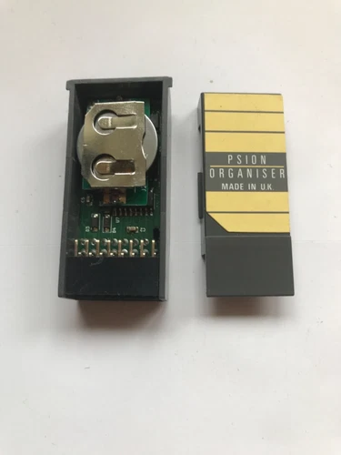 PSION II 32k RAMPACK WITH REPLACEABLE BATTERY HOLDER.